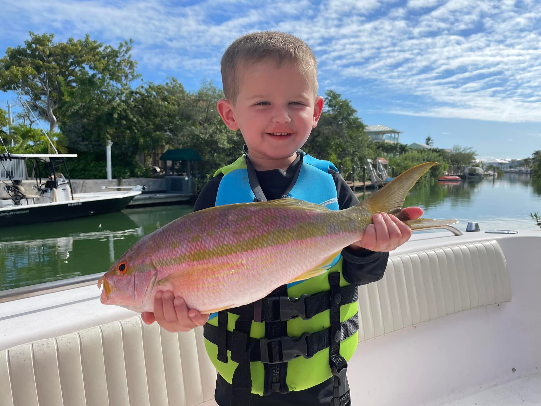 My nephew Dillon with a flag yellowtail snapper! That’s a happy kid right their!… My nephew Dillon with a flag yellowtail snapper! That’s a happy kid right their!…